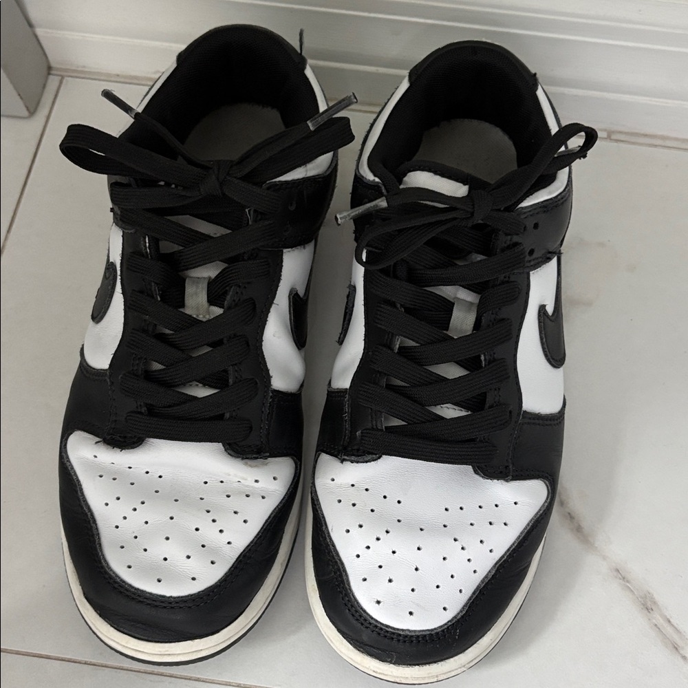 Men’s NIKE Dunk Low Retro Black and White Sneakers